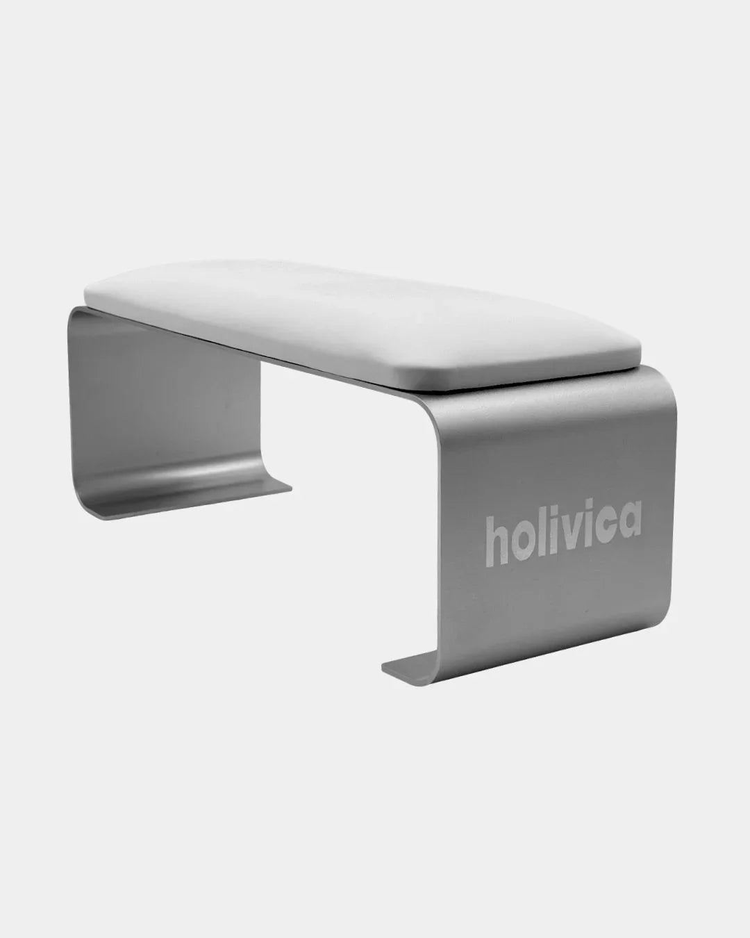 Podpórka do manicure Elise marki Holivica — złota, nowoczesna, z białym obiciem, elegancka i stabilna. Logo „holivica” z boku, idealna do pracy przy stylizacji paznokci.